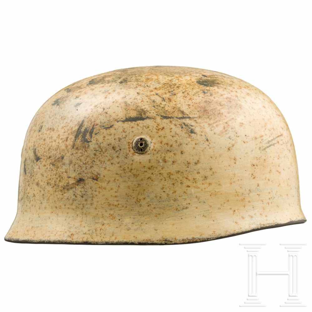 An M 38 steel helmet for paratroopers with winter camouflage paintThe skull with white camouflage - Image 2 of 9