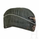 A Garrison Cap for Officers of the Waffen SSField-grey gabardine, silver mesh piping around side