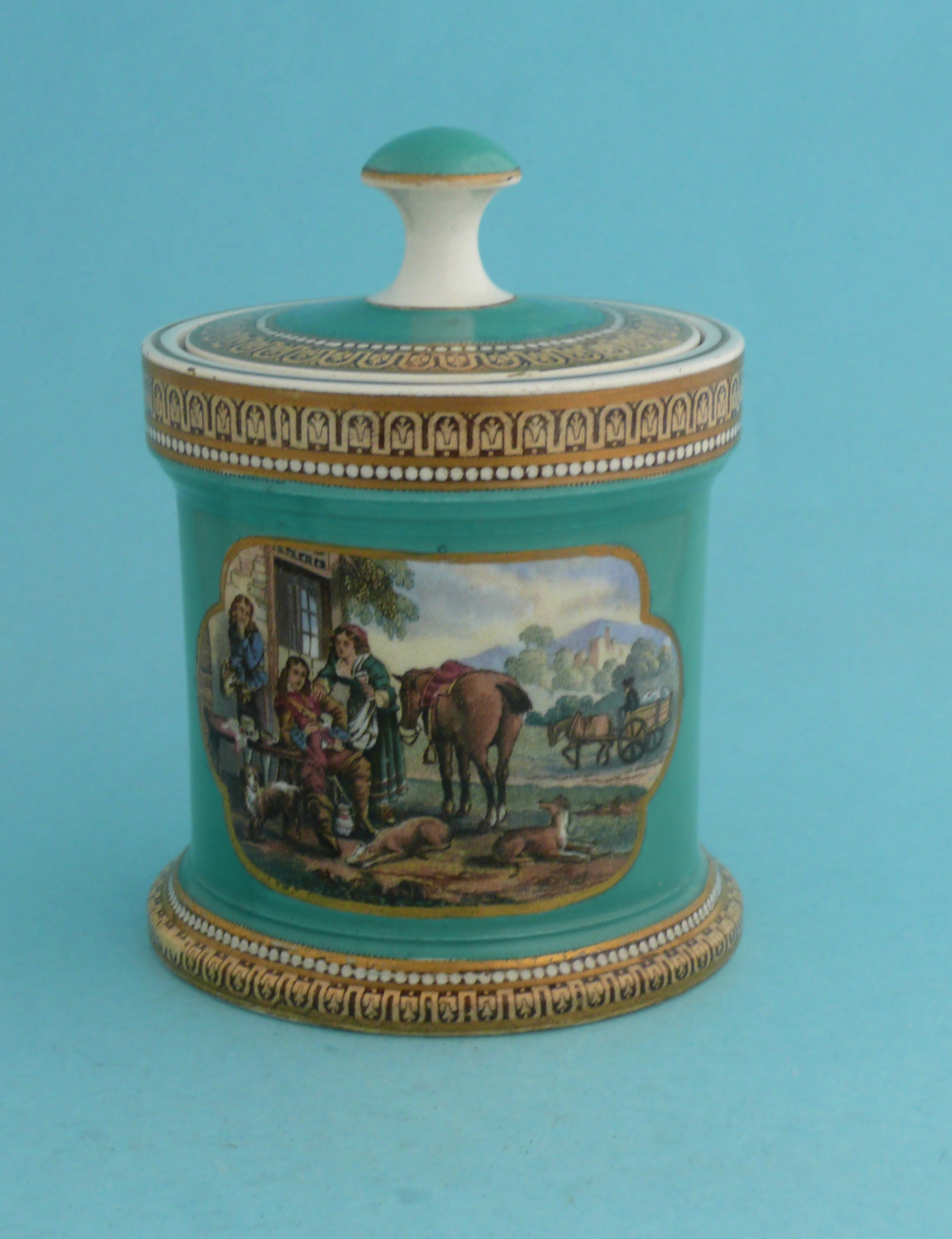 A cylindrical tobacco jar and cover: Driving Cattle (387) and Cavalier and Serving Woman (381)