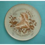 1897 Jubilee: a large circular pottery plaque moulded with a head in profile