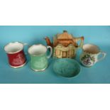 1951 Festival of Britain: a cottage teapot by Paramount Pottery, two Paragon mugs, another