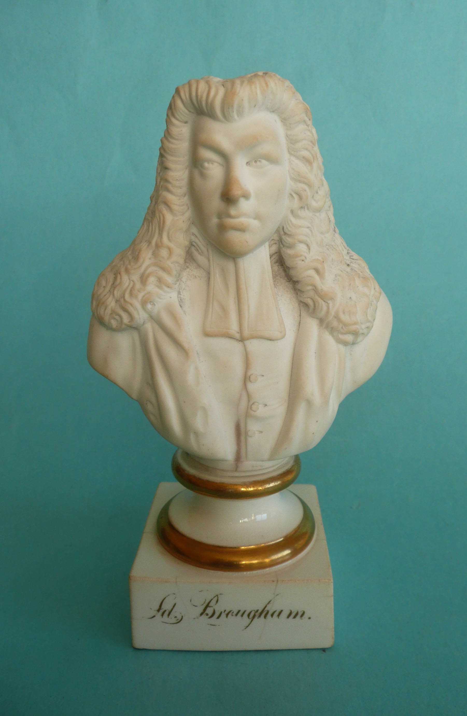 Lord Brougham: a bisque portrait bust on gilt named square glazed base, circa 1831, 150mm.