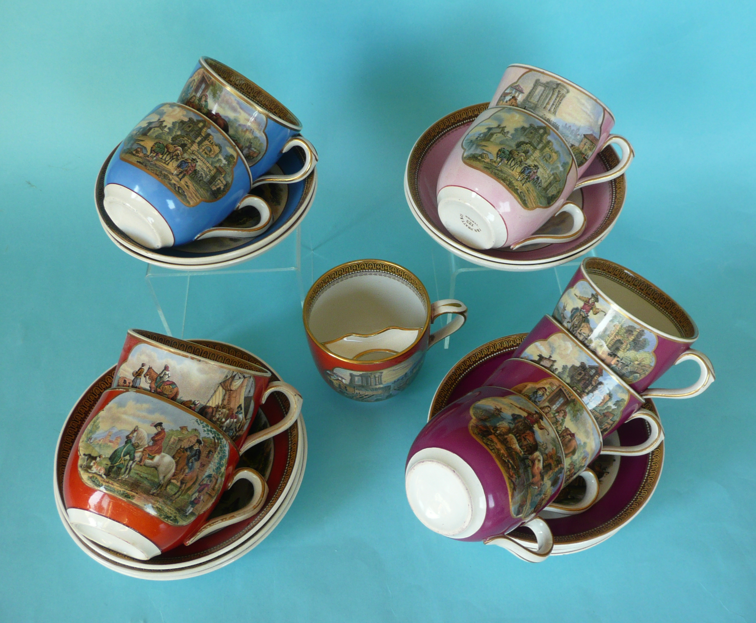 A moustache cup and saucer and two cups and saucers all red, two blue, two pink and four maroon (18)