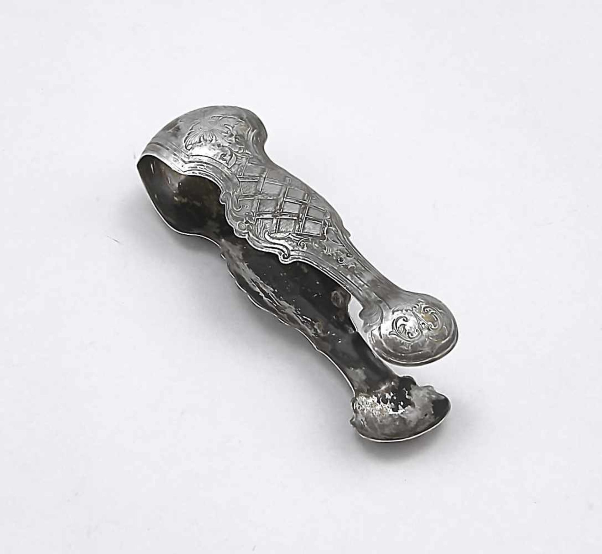 Sugar tongs, 19th century, silver 12 (750/000), with ornamental and floral engraving