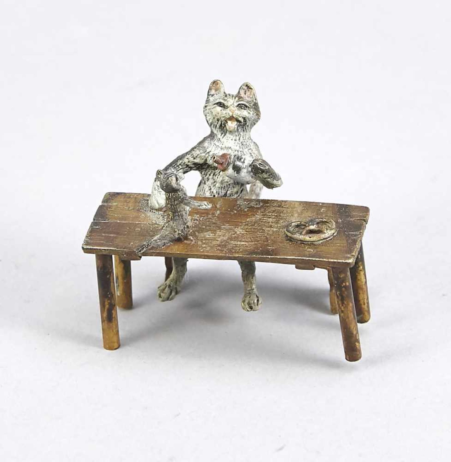Vienna bronze, 20th century, cat sitting on a bench with pretzel and giving her boy a milk