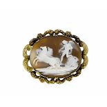Gem brooch GG 750/000 ungest., Expertized, with an oval, very finely carved shell gem,
