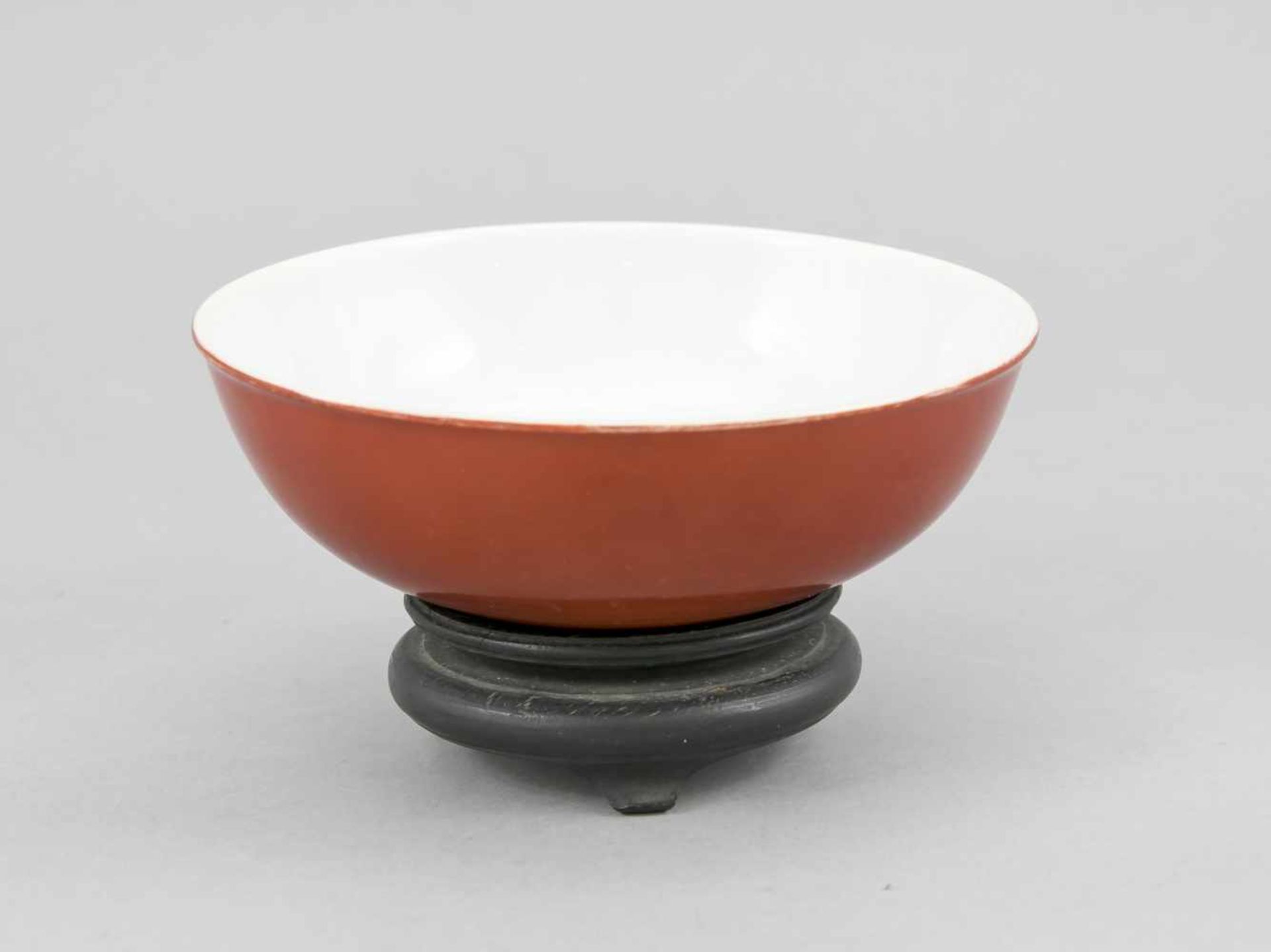 Monochrome cup, China, probably 19th cent. Outside in iron red, in the center of the