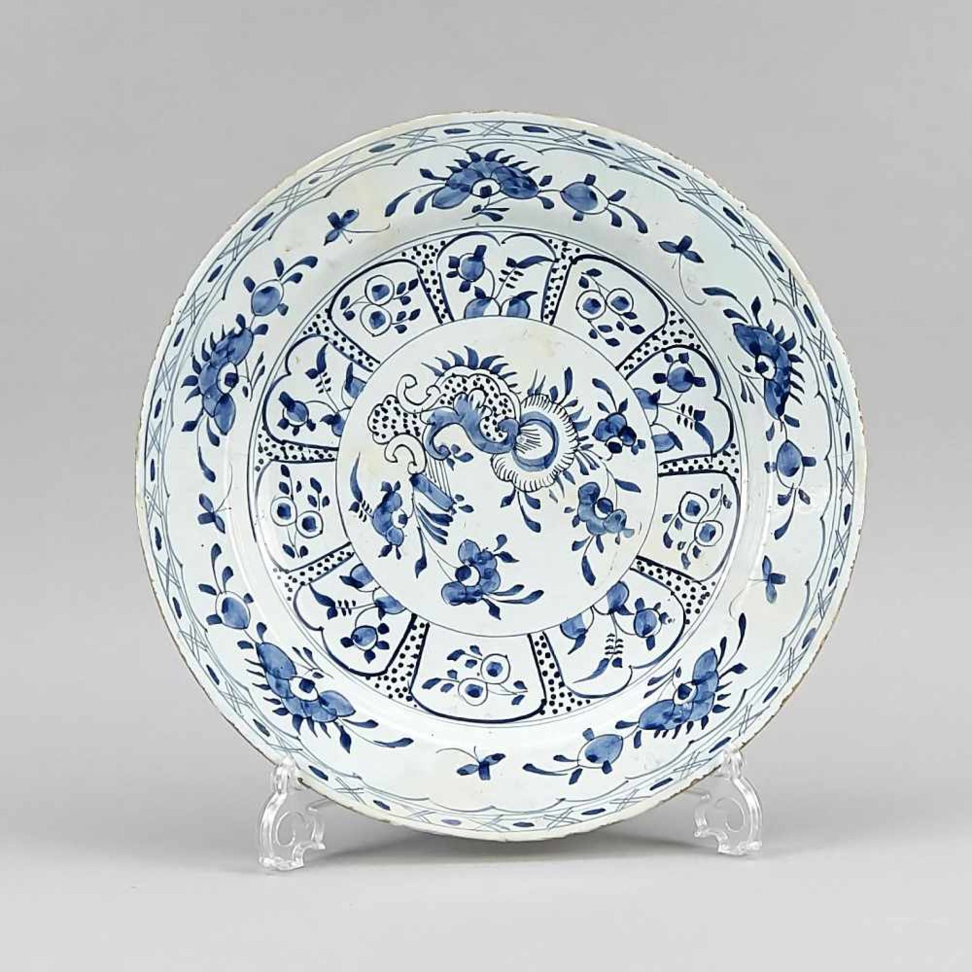 Bowl. Faience, presumably Holland, 18th cent. Blue painting, cracked and restored, Ø 35 cm<
