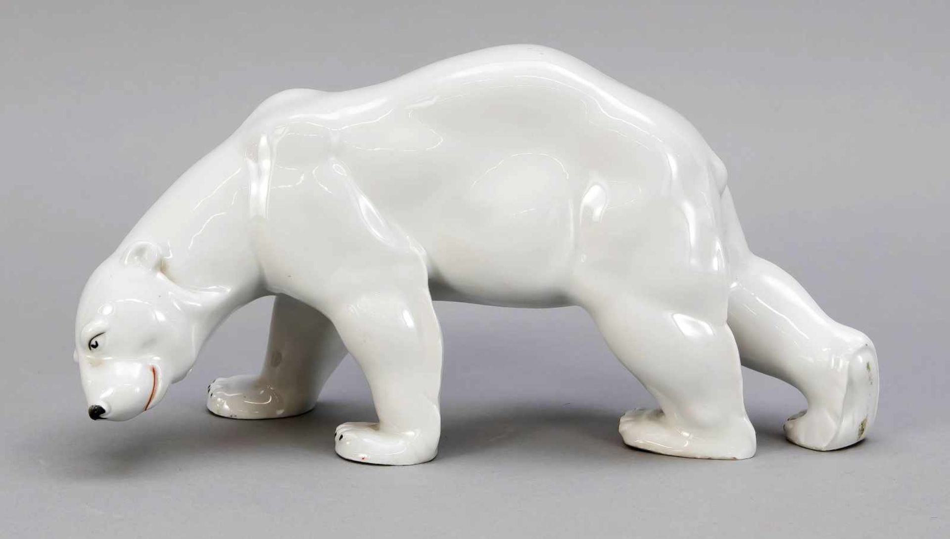 SWalking Polar Bear, Lichte, Thuringia, 20th C., small Fire cracks, min. painted, L. 27 cm