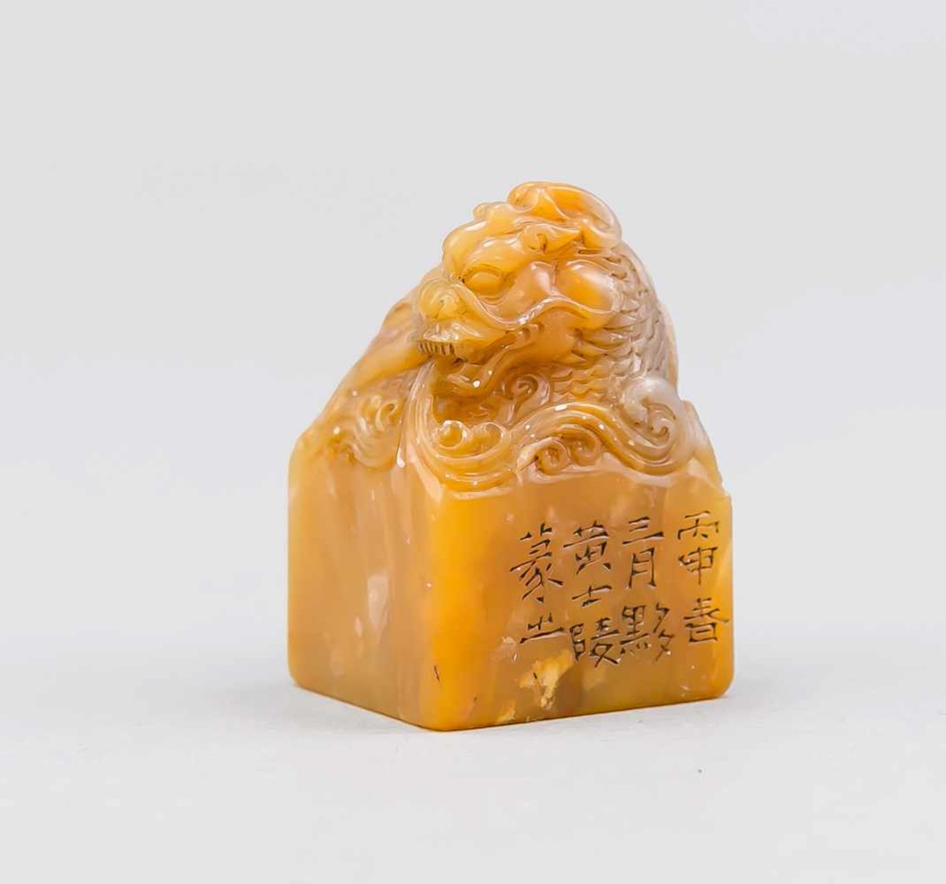 Seal with Dragon Knob, China, Qing Dynasty. Beige-brown stone with seal and dragon knob,