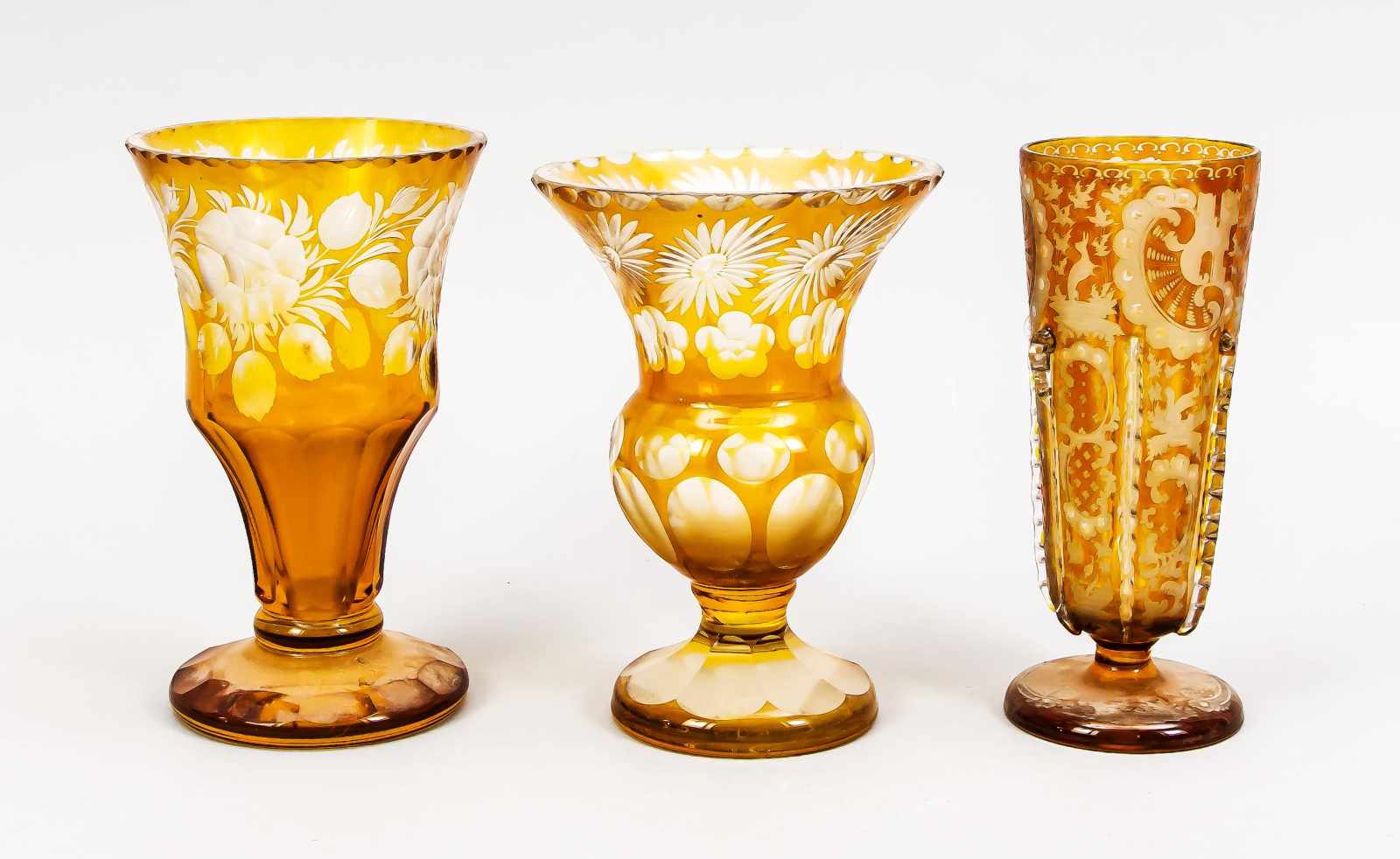 Three vases, 19th/20th century, different shapes and sizes, each clear glass, overlaid