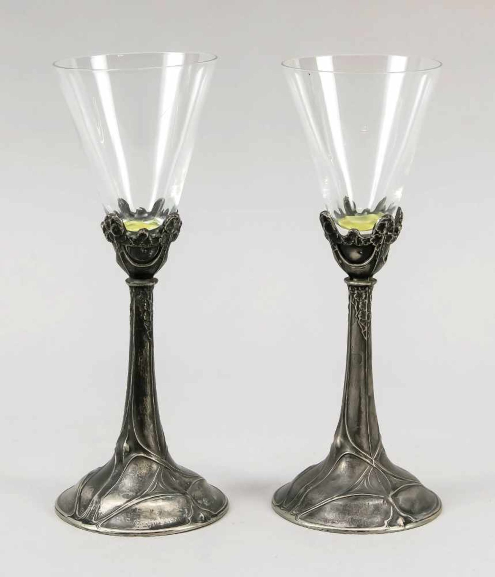 A pair of Art Nouveau glasses, around 1900, round, domed stand merging into the taperedshaft, tin,