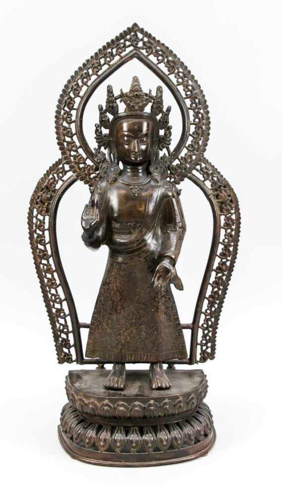 Buddhistische Heiligenfigur, Tibet, wohl 19. Jh., Bronze. Stehend auf doppeltemLotussockel in