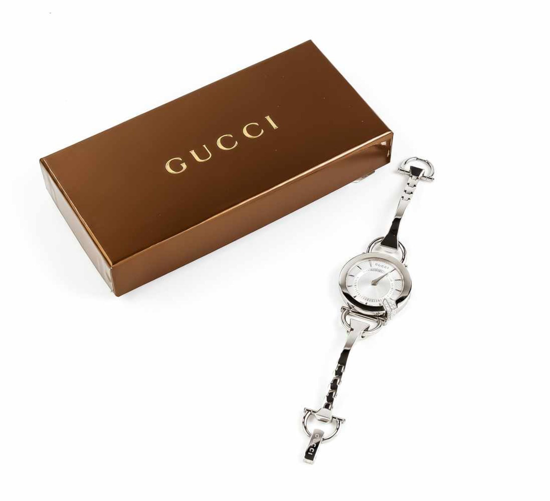 Gucci Damenquarzuhr, Mod. 122.5, in Anlehnung an einen Hufnagel und Steigbügel, mit 16