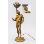 Figürliche Lampe, Ende 19. Jh., Bronze mit Restvergoldung. Runder, profilierter Sockel mit