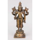 Figur einer Gottheit, Nepal, 19. Jh., Bronze. Stehend auf einem runden Lotussockel auf