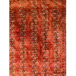 A PERSIAN STYLE CARPET ORANGE / BLUE PATTERN - APPROX 84 INCH X 49 INCH
