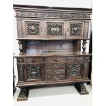 IMPRESSIVE OVERSIZED DARK OAK DRESSER WITH HEAVILY CARVED DETAIL