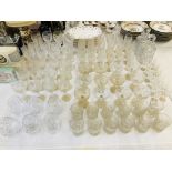 APPROX 90 GOOD QUALITY CUT GLASS DRINKING GLASSES OF VARIOUS FORMS & SIZES + PAIR OF MATCHING