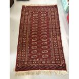 A SUPERFINE MORIGUL BOKHARA AFGHAN CARPET - RED/ORANGE - APPROX 5FT 2 INCH X 3FT 1 INCH (WITH