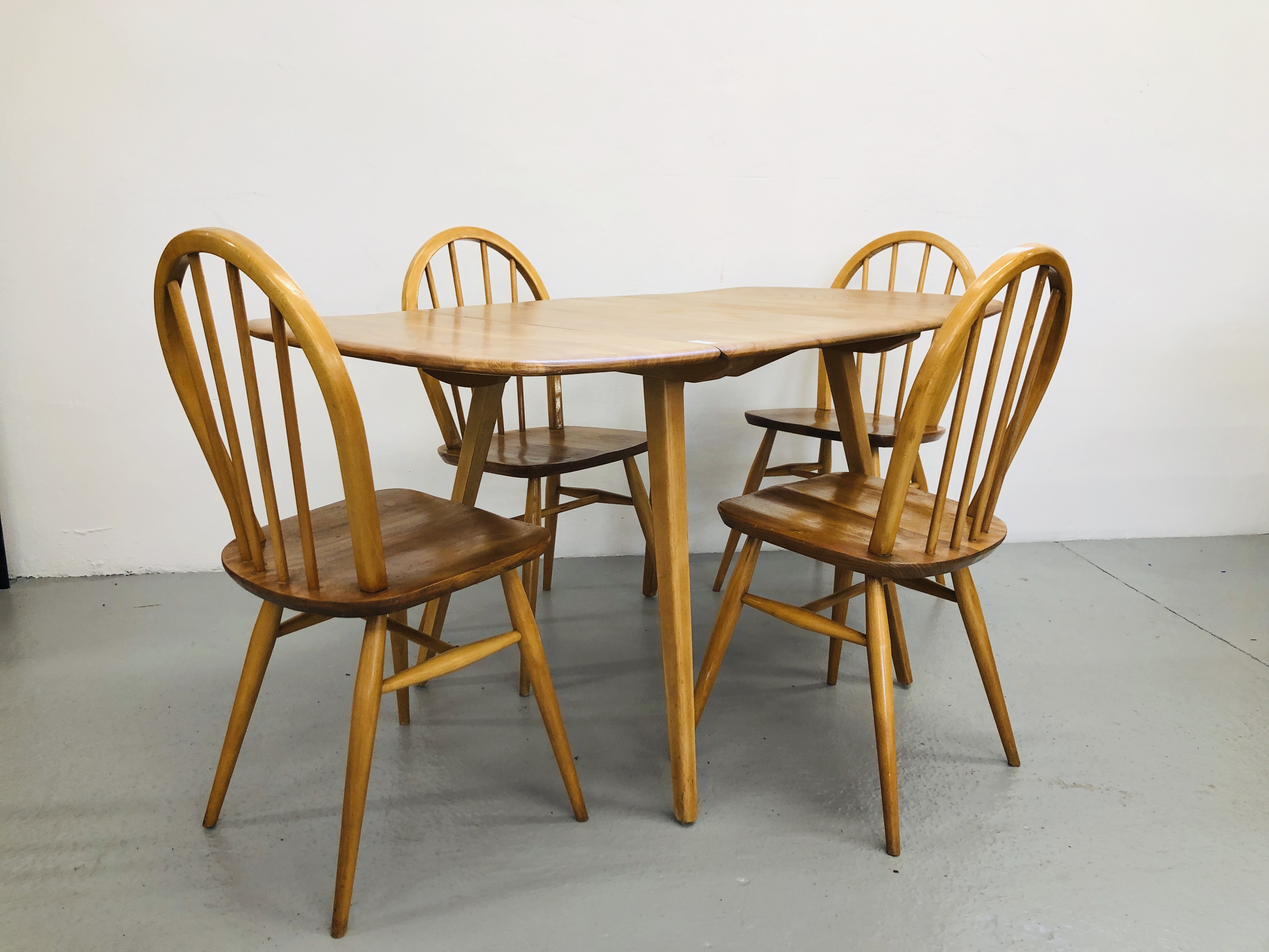 ERCOL DROP FLAP DINING TABLE AND FOUR ERCOL DINING CHAIRS