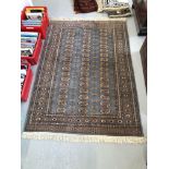 A SUPERFINE MORIGUL BOKHARA AFGHAN CARPET - BLUE/BROWN - APPROX 6FT 1 INCH X 4FT 3 INCH (WITH