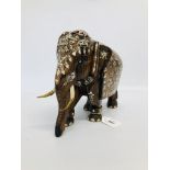 HAND CARVED WOODEN ELEPHANT WITH INLAID DETAIL STANDING APPROX 20CM TALL