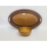 AN ORIENTAL CARVED HARDWOOD OVAL TRAY TOGETHER WITH A TREEN BOWL (POSSIBLY COCONUT)