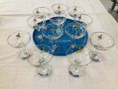 A SET OF 12 BABYCHAM GLASSES (ONE PLAIN) TOGETHER WITH AN ORIGINAL BABYCHAM TRAY
