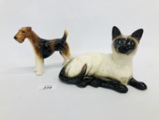 A BESWICK CAT AND DOG ORNAMENT