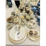 A COLLECTION OF VARIOUS COMMEMORATIVE WARE TO INCLUDE MUGS AND JUGS OF VARYING AGES,