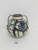 A POOLE POTTERY TWO HANDLED VASE