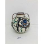 A POOLE POTTERY TWO HANDLED VASE