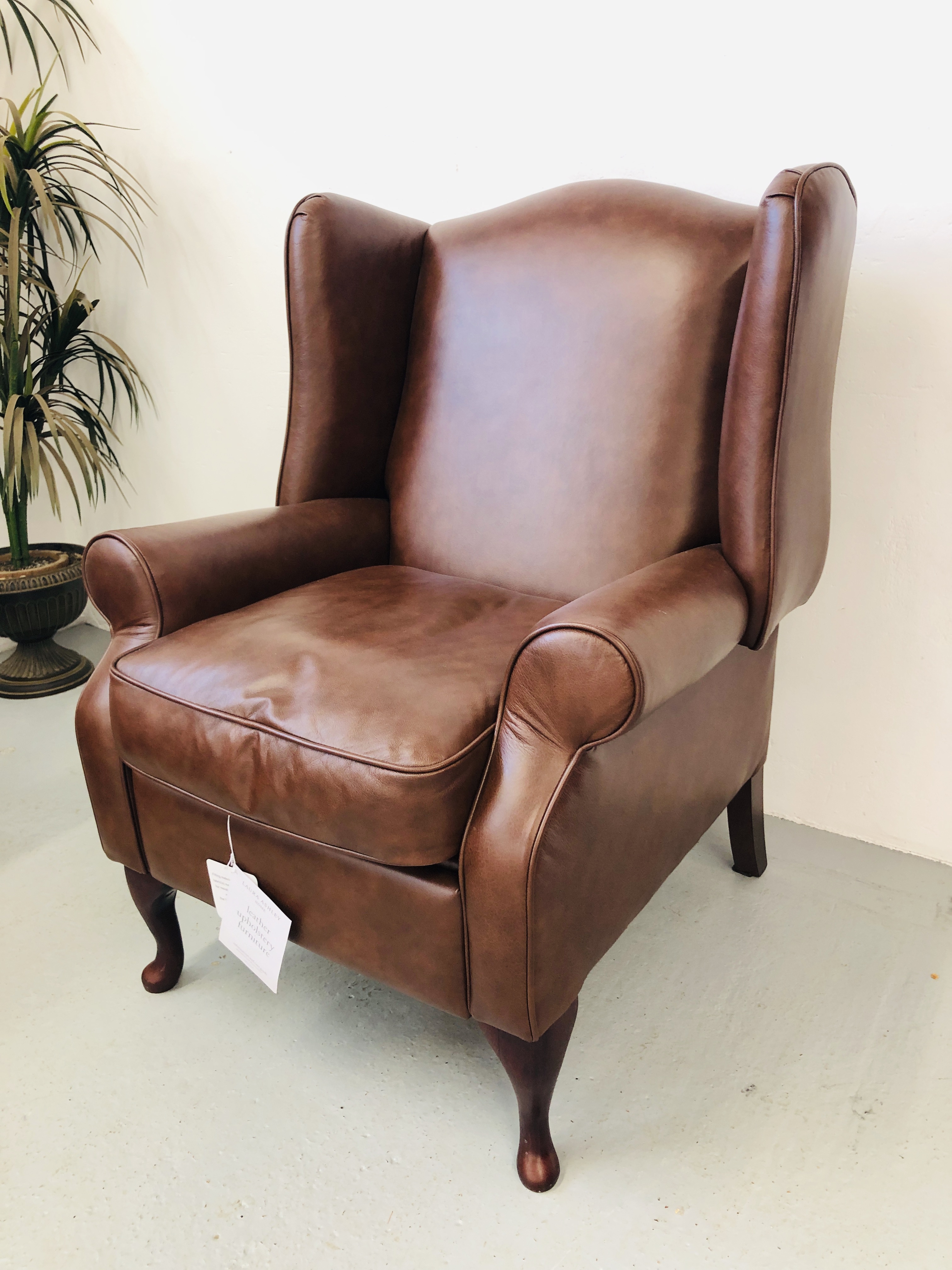 A LAURA ASHLEY TAN LEATHER TWO SEATER SOFA AND MATCHING LAURA ASHLEY TAN LEATHER WINGED RECLINER - Image 7 of 7