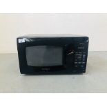 A DAEWOO COMPACT MICROWAVE OVEN - SOLD AS SEEN