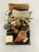A BOX OF COLLECTIBLES TO INCLUDE VINTAGE TINS, IRONS, BELLOWS, A PAIR OF BRASS CANDLESTICKS,