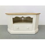 A MODERN CREAM FINISH CORNER TELEVISION STAND WITH LIGHT OAK TOP