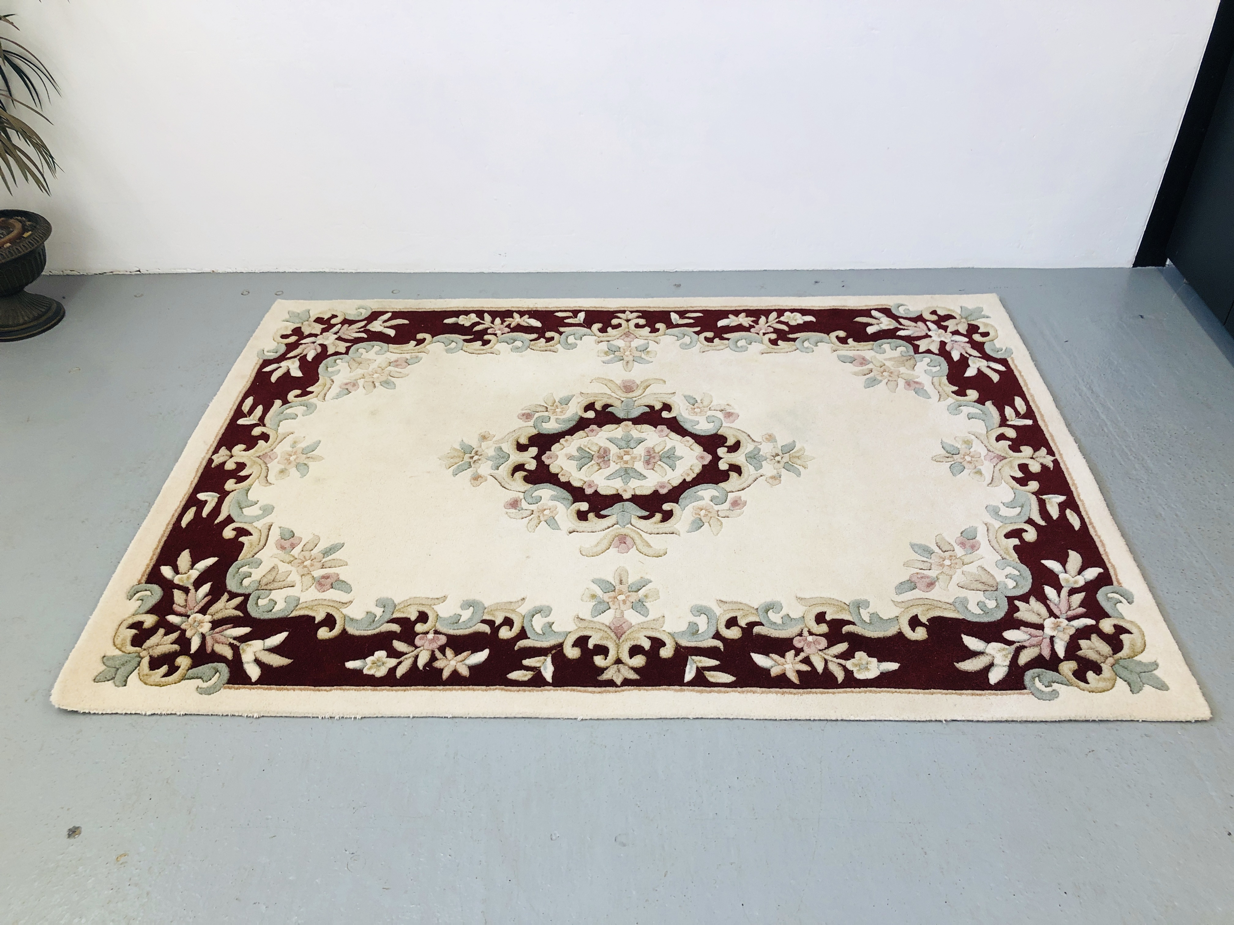 2 X HAND MADE INDIAN 100% WOOL PATTERNED CARPETS RED / CREAM APPROX 93 INCH X 64 INCH AND 71 INCH X