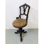 AN ORNATE VICTORIAN RISE AND FALL MUSIC SEAT
