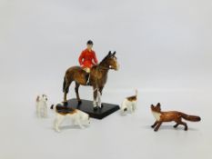 A BESWICK HUNTSMAN ON HORSE FIGURE ALONG WITH 3 BESWICK FOX HOUNDS AND BESWICK FOX