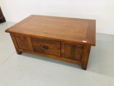 A HARDWOOD RECTANGULAR COFFEE TABLE WITH DRAWER 47 INCH LENGTH,