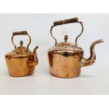 A LARGE COPPER KETTLE AND ONE SMALLER