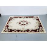 2 X HAND MADE INDIAN 100% WOOL PATTERNED CARPETS RED / CREAM APPROX 93 INCH X 64 INCH AND 71 INCH X