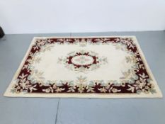 2 X HAND MADE INDIAN 100% WOOL PATTERNED CARPETS RED / CREAM APPROX 93 INCH X 64 INCH AND 71 INCH X