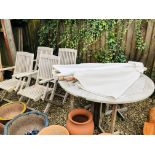 A SET OF FOUR TEAK FOLDING PATIO CHAIRS WITH FOLDING TEAK PATIO TABLE AND TWO PARASOLS