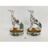 PAIR OF ORIENTAL FLORAL DECORATED DOGS BEARING CHINESE SYMBOLS TO BASE