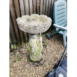 A STONEWORK GARDEN FEATURE "THE THREE GRACES SUPPORTING A PLANTER" HEIGHT 34 INCH
