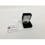 A SOLITAIRE LAVENDER QUARTZ RING WITH CERTIFICATE MARKED 10K 375