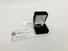A SOLITAIRE LAVENDER QUARTZ RING WITH CERTIFICATE MARKED 10K 375