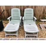 A PAIR OF UPVC SUN LOUNGER CHAIRS WITH CUSHIONS